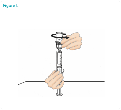 Hands disconnecting the vial from the syringe.